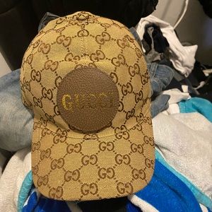 Gucci brown hat. It’s new.